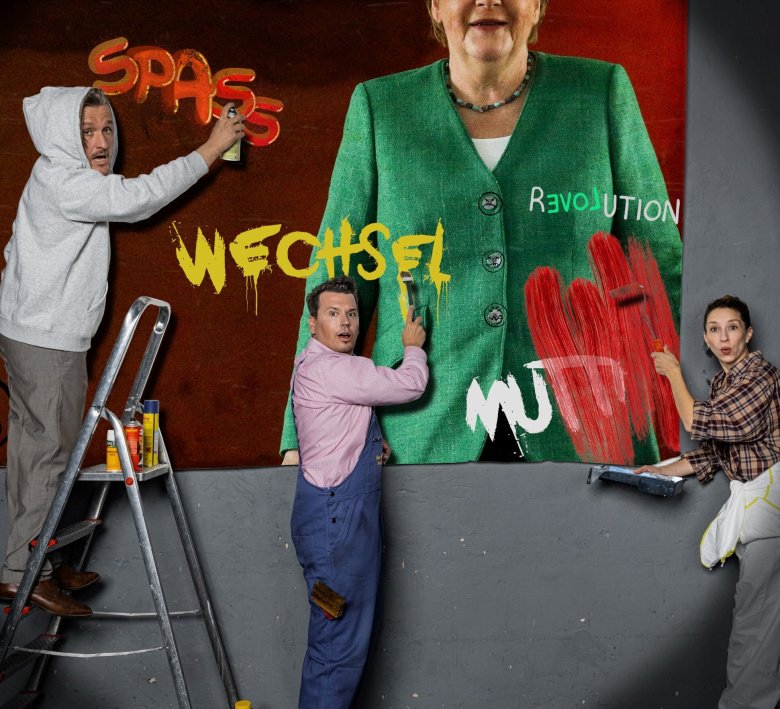 Personen mit Plakat der Ex-Kanzlerin Merkel
