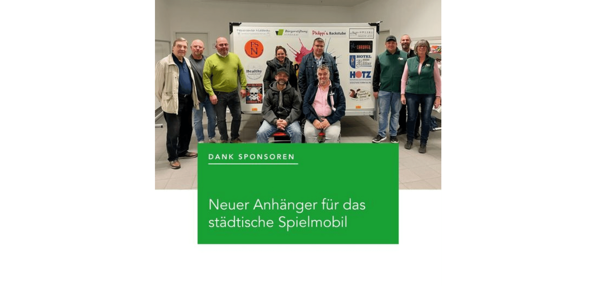 Mitarbeiter posieren für Foto