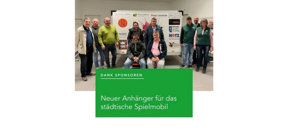 Mitarbeiter posieren für Foto