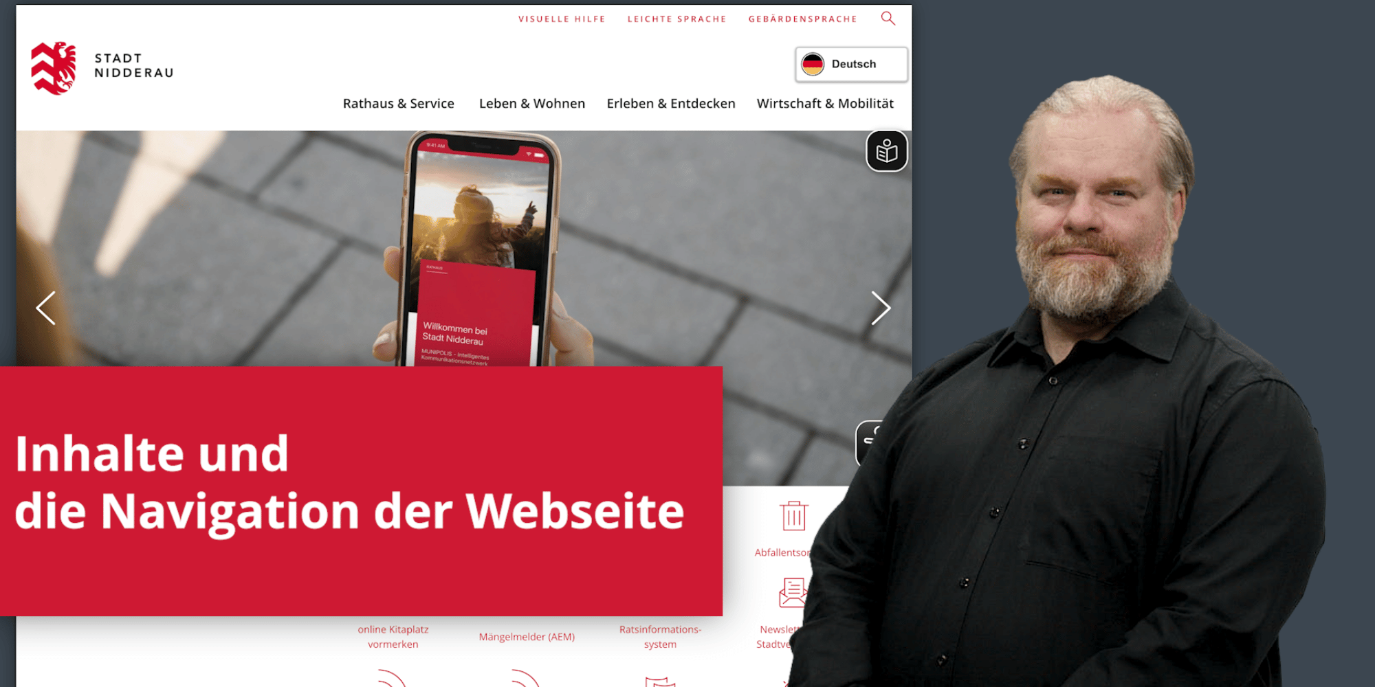 Mann in schwarzem Hemd stehend vor einem Hintergrundbild der Startseite der Homepage der Stadt Nidderau