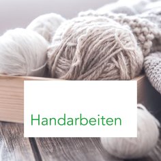 Wollknäuel mit Textbox "Handarbeiten"
